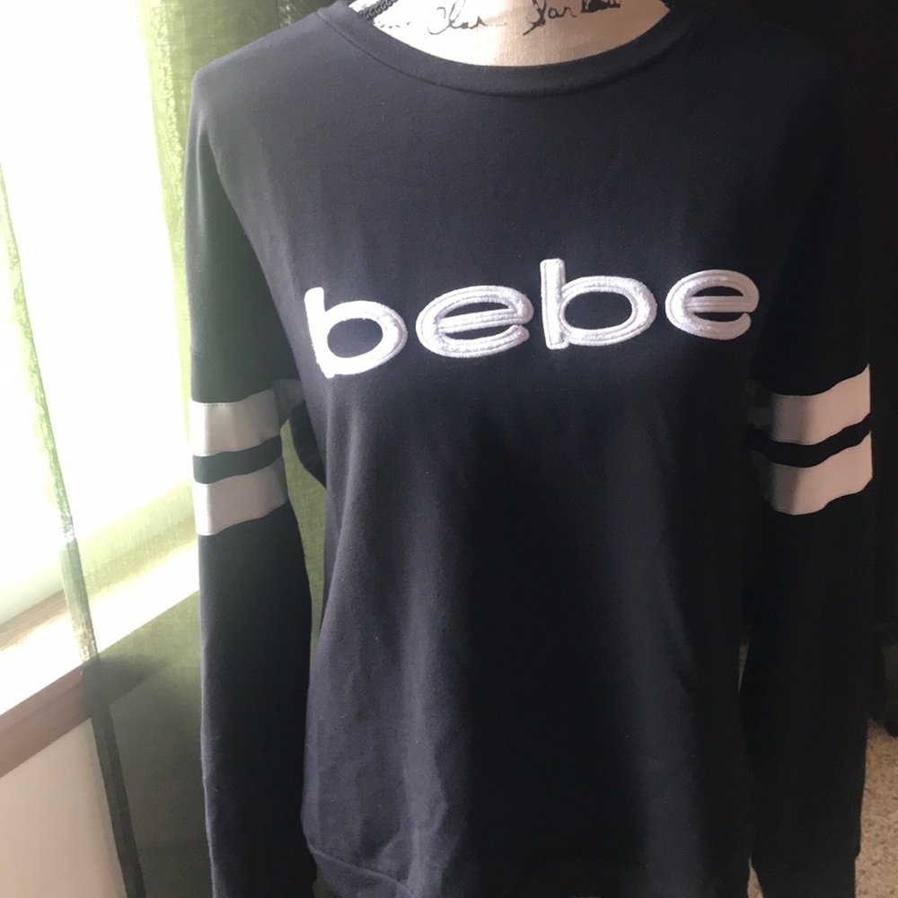 Large long sleeve lightweight Bebe sweatshirt.